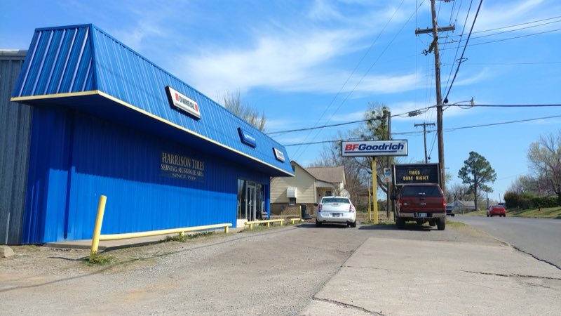 Harrison Tire building from the street with Tires Done Right marquee sign