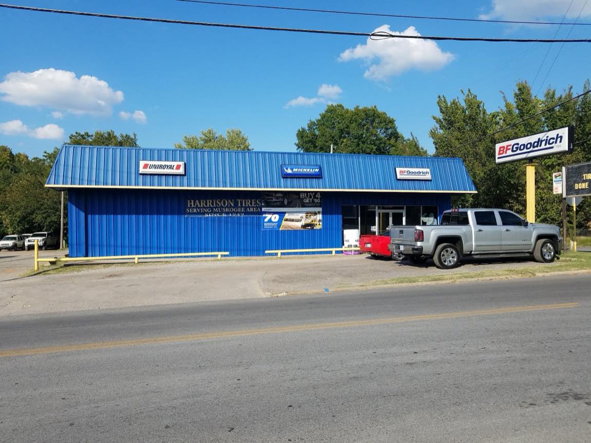 Harrison Tire & Supply's blue storefront on Martin Luther King St in Muskogee